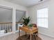 Bright office space with natural light, desk, and open view to the lower level at 1103 Mallory Ln, Durham, NC 27713