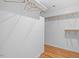 Spacious walk-in closet with multiple rods and shelving, offering ample storage solutions at 1120 Colonial Club Rd, Wake Forest, NC 27587