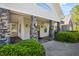 Charming building exterior with stone accents, complemented by professionally landscaped grounds at 1120 Colonial Club Rd, Wake Forest, NC 27587