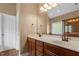Bathroom with double sink vanity and tiled floors at 1153 Litchborough Way, Wake Forest, NC 27587