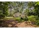 Backyard featuring a fire pit and seating area, with the house visible in the background at 116 Justice St, Chapel Hill, NC 27516