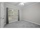 Bedroom featuring neutral walls, a ceiling fan, carpet, and a window at 116 Justice St, Chapel Hill, NC 27516