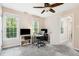 This light-filled office boasts abundant natural light and a dedicated workspace at 11619 Appaloosa W Run, Raleigh, NC 27613