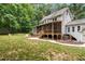 This lovely home features a spacious backyard with a screened-in porch at 11619 Appaloosa W Run, Raleigh, NC 27613