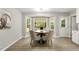 Charming dining room bathed in natural light from a bright bay window at 117 S Woodstone Dr, Archer Lodge, NC 27527