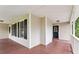 Spacious wraparound porch with wood flooring, perfect for enjoying the outdoors at 117 S Woodstone Dr, Archer Lodge, NC 27527
