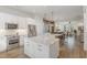 Modern kitchen featuring white cabinets, stainless steel appliances, and an island at 1172 Cottonsprings Dr, Wendell, NC 27591