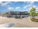 Grocery store parking lot in a shopping center with many cars and ample parking spaces at 1172 Cottonsprings Dr, Wendell, NC 27591