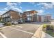 Shopping center featuring a variety of retail stores, parking lots, and modern architectural elements at 1172 Cottonsprings Dr, Wendell, NC 27591