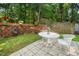 Outdoor patio with a view of the backyard and wooden fence that adds privacy to the property at 121 Trevor Ridge Dr, Holly Springs, NC 27540