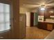 Kitchen offering appliances, wood cabinets, and ample counter space at 1225 Fairlane Rd, Cary, NC 27511