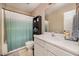 Bathroom showcasing a bathtub, toilet, and a white vanity with matching mirror at 1261 Grovewood Dr, Clayton, NC 27520