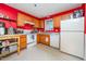 Functional kitchen with wooden cabinets, white appliances, and practical layout, ready for your culinary creations at 1261 Grovewood Dr, Clayton, NC 27520