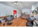 Spacious living room with hardwood floors, and comfortable seating, perfect for relaxing and entertaining at 1261 Grovewood Dr, Clayton, NC 27520