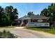 Inviting clubhouse at 'The River at Lake Royale' with a ramp and ample parking at 133 Black Cloud Dr, Louisburg, NC 27549