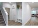 Welcoming entryway with stylish coat rack and bench, leading to a comfortable living space at 133 Black Cloud Dr, Louisburg, NC 27549