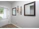 Inviting foyer with decorative mirrors and sconces, leading into the home at 133 Black Cloud Dr, Louisburg, NC 27549