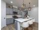 Bright kitchen featuring a large island with seating, perfect for casual dining at 133 Black Cloud Dr, Louisburg, NC 27549