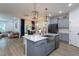 Open-concept kitchen with seamless flow to the dining and living areas at 133 Black Cloud Dr, Louisburg, NC 27549