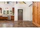 Close up of the kitchen featuring a farmhouse sink, stainless steel appliances, and dark wood cabinets at 136 Vireo Ln, Hillsborough, NC 27278