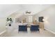 Upstairs bonus room with comfortable seating, a ceiling fan and tv at 14 Water Front Ln, Timberlake, NC 27583