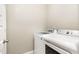 Well-equipped laundry room with modern washer and dryer units for convenient chores at 14 Water Front Ln, Timberlake, NC 27583