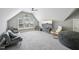 Bonus room with vaulted ceiling and a television for entertainment at 1419 Endgame Ct, Wake Forest, NC 27587