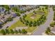 Take in the breathtaking aerial view of the community, highlighting the lush landscaping, green spaces, and meticulously planned neighborhood at 149 N Serenity Hill Cir, Chapel Hill, NC 27516
