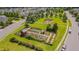 Breathtaking aerial view showcasing the manicured landscaping, garden, pergola, and green spaces within the community at 149 N Serenity Hill Cir, Chapel Hill, NC 27516