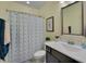 Cozy bathroom features a shower with a patterned curtain and a modern vanity with stylish accents at 149 N Serenity Hill Cir, Chapel Hill, NC 27516