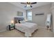 Cozy bedroom with a stylish bed, neutral walls, and a bright window for natural light at 149 N Serenity Hill Cir, Chapel Hill, NC 27516