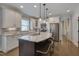 Gorgeous kitchen with a large island, granite counters, stainless appliances, and ample storage at 149 N Serenity Hill Cir, Chapel Hill, NC 27516