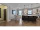 Stylish kitchen with a breakfast nook, granite countertops, and stainless steel appliances at 149 N Serenity Hill Cir, Chapel Hill, NC 27516