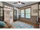 Cozy living room with natural light, ceiling fan, and stylish decor with view to the foyer at 149 N Serenity Hill Cir, Chapel Hill, NC 27516