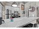 Bright kitchen featuring modern appliances and granite countertops at 1500 River Mill Dr # 101, Wake Forest, NC 27587