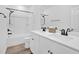 Bright bathroom with double sink vanity, quartz countertops, and modern fixtures at 1505 Willow Landing Way, Willow Springs, NC 27592