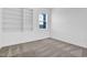 Simple bedroom featuring a modern window, a large closet, and neutral carpet at 1505 Willow Landing Way, Willow Springs, NC 27592