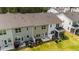Townhome backyard features patios, green space, and privacy fences, perfect for outdoor entertaining and relaxation at 156 Velvet Ridge Way, Garner, NC 27529