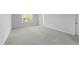 The bedroom has plush carpeting and a window for natural light at 156 Velvet Ridge Way, Garner, NC 27529