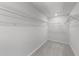 Walk in closet with carpet and wire shelving for storage at 156 Velvet Ridge Way, Garner, NC 27529