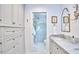 Elegant bathroom featuring marble countertops, and a glass-enclosed walk-in shower at 18 Clearwater Dr, Durham, NC 27707