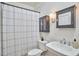 The bathroom has a neutral color palette and stylish vanity at 18 Clearwater Dr, Durham, NC 27707