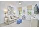 Cozy bedroom features a comfortable couch, and lots of natural light at 18 Clearwater Dr, Durham, NC 27707