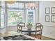 This kitchen features a bright breakfast nook with a round table and window views at 18 Clearwater Dr, Durham, NC 27707