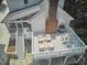Aerial view of spacious deck and screened-in porch, perfect for outdoor entertaining with grilling area and dining table at 18 Clearwater Dr, Durham, NC 27707