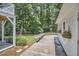 Inviting wooden deck and bench seating surrounded by a lush backyard landscape at 18 Clearwater Dr, Durham, NC 27707