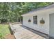 Charming deck with flower boxes against the backdrop of mature trees at 18 Clearwater Dr, Durham, NC 27707