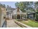 Charming exterior showcasing a deck, patio, and beautiful backyard at 18 Clearwater Dr, Durham, NC 27707