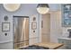 Bright open kitchen features stainless steel appliances and a large center island at 18 Clearwater Dr, Durham, NC 27707
