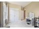 Bright and airy bedroom with carpet, makeup table, stool, and closet at 1818 Misty Hollow Ln, Apex, NC 27502